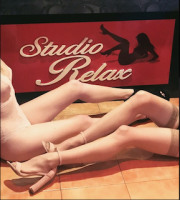 Studio Relax Gentlemens Club Company Logo